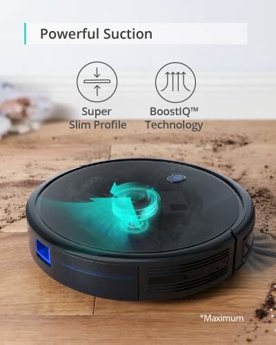 Robot vacuum cleaner with powerful suction on a wooden floor.